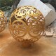 鏡面鏤空球雕塑圖