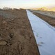 新疆700克两布一膜-复合土工膜-化工污水池展示图