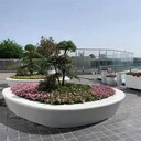 景琪施工隊制作巢湖小區(qū)公園藝術(shù)混凝土真石麗泰科石坐凳