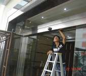 西安小寨玻璃门维修,电子城地弹簧玻璃门维修安装