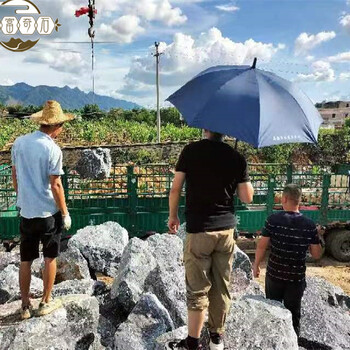 清遠(yuǎn)黑山石原石定制黑山石多少錢一噸？