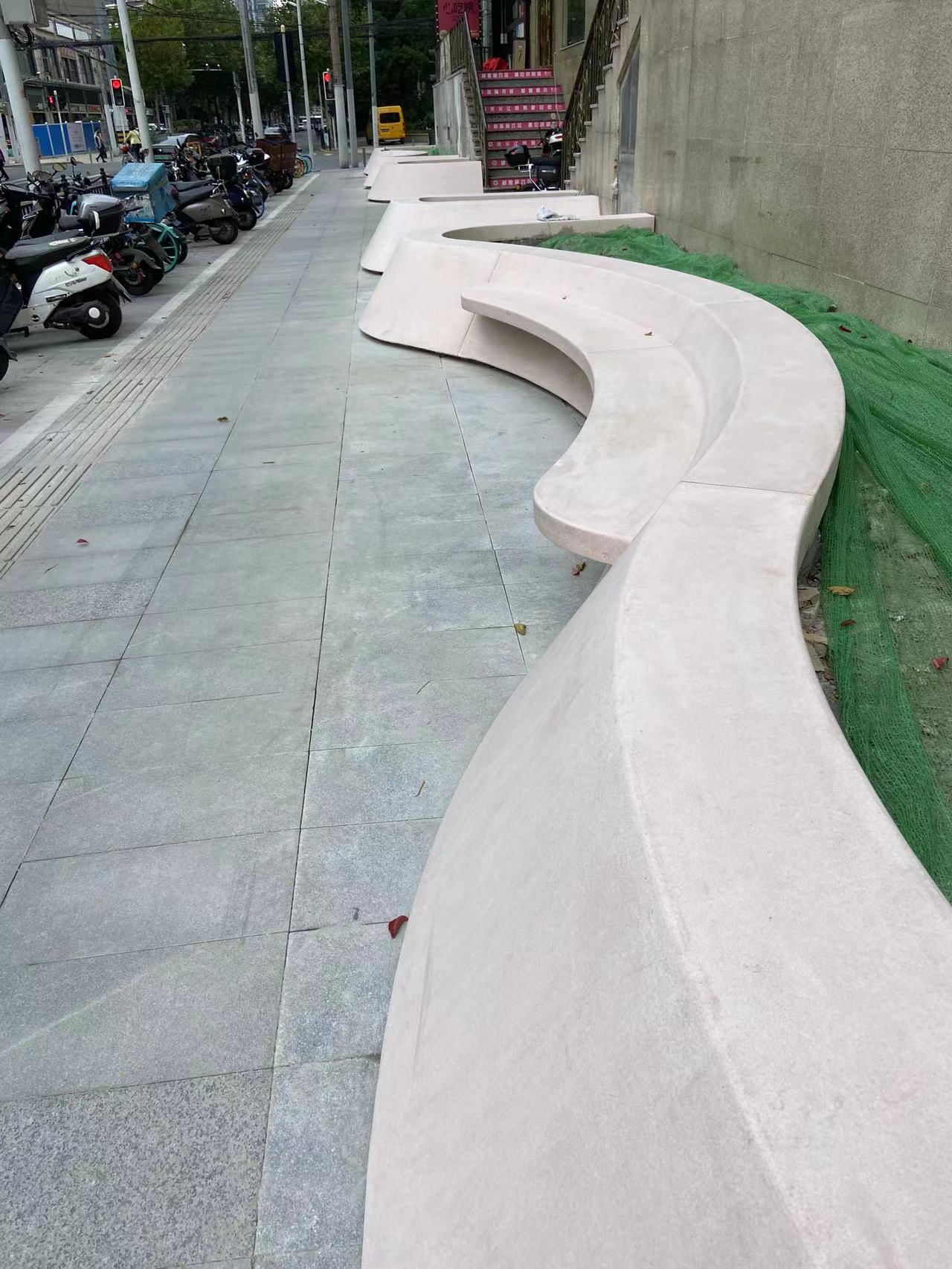 上海公园泰科仿石坐凳预制无机磨石花坛现场施工设计