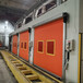 山东焊接房升降门机器人焊接生产线卷帘门工业快速门生产厂家