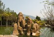 北京朝阳仿木水泥假山栏杆雕塑设计施工