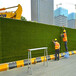 军绿色30针工地外墙草坪背景墙罗山房地产草坪围墙